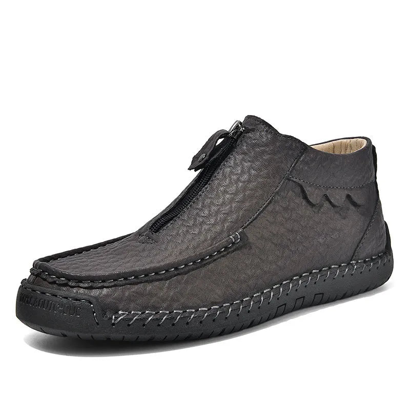 Men's leather slip-on loafers in black brown or grey colours showing round toe and rubber sole design