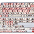 Pink PBT keyboard key cap with a colourful fragrant pig design on the top and sides.