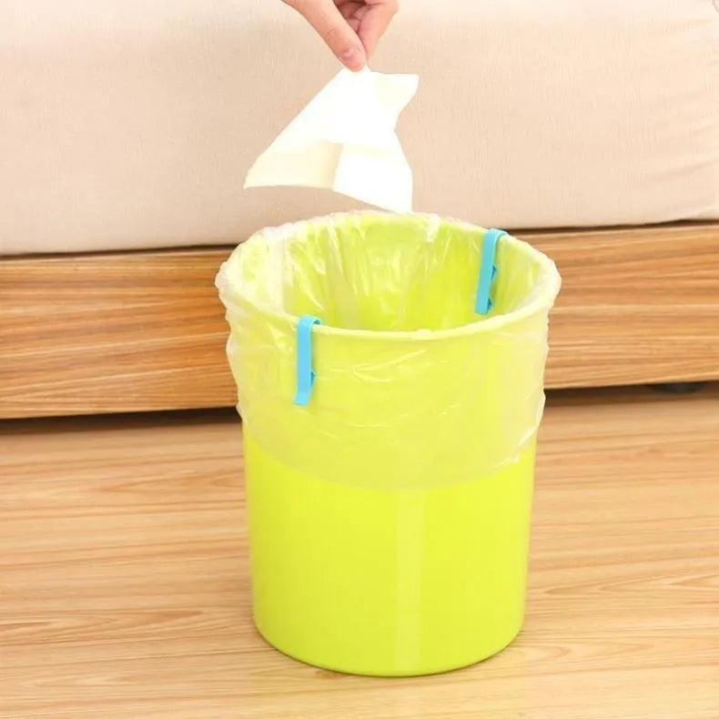 PP plastic non-slip clip for securing rubbish bags to the side of a bin.