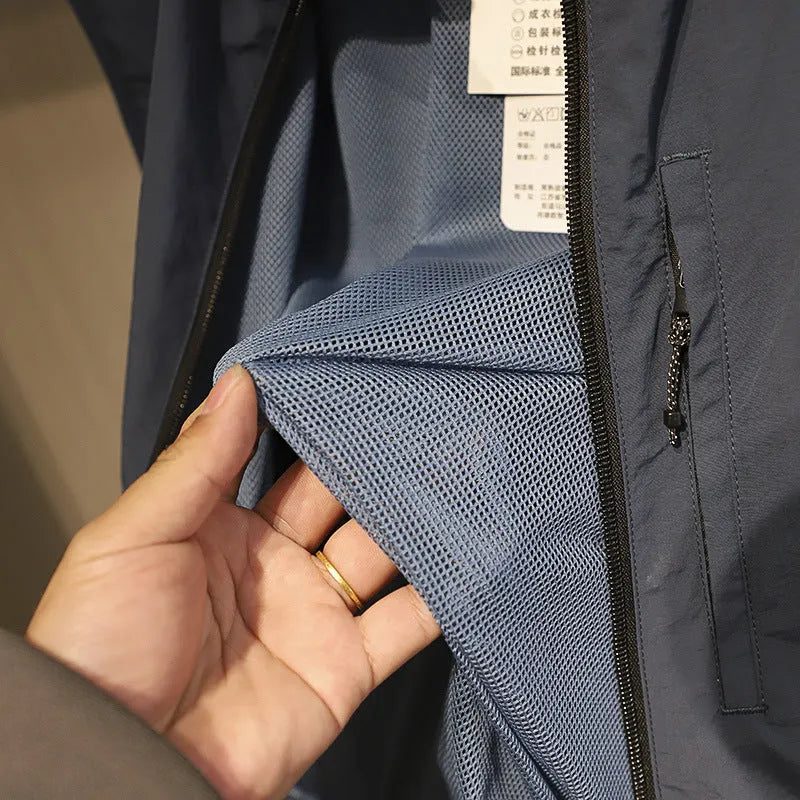 Men's straight-cut nylon vest in Army Green with side seam pockets.