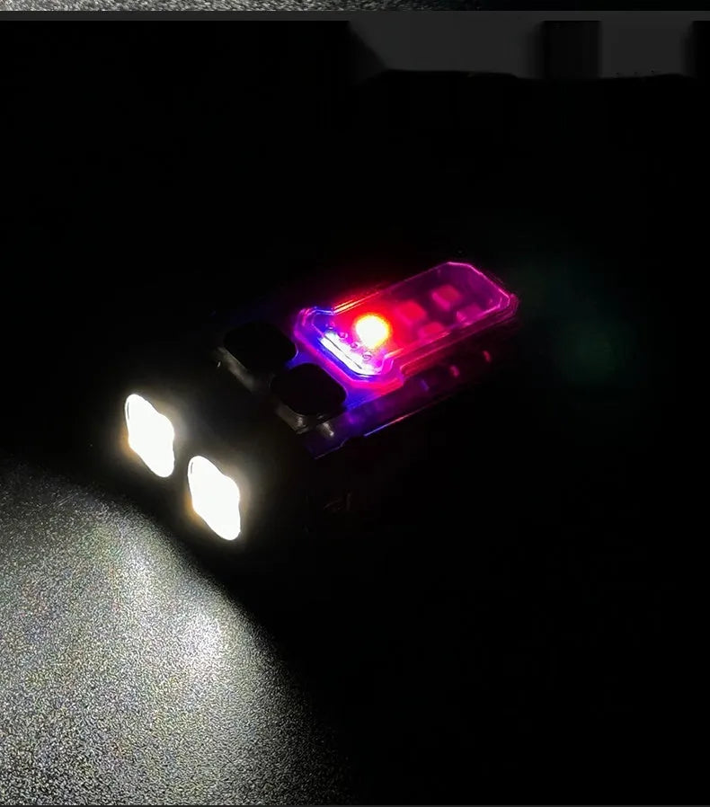 Portable tactical mini warning flashlight with a black housing, showing the LED lens, a side mounting clip, and an included USB charging cable.
