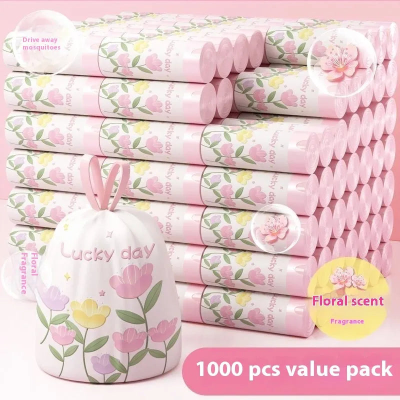 Pink degradable argy wormwood mosquito repellent garbage bags with drawstring, size 44cm x 48cm.