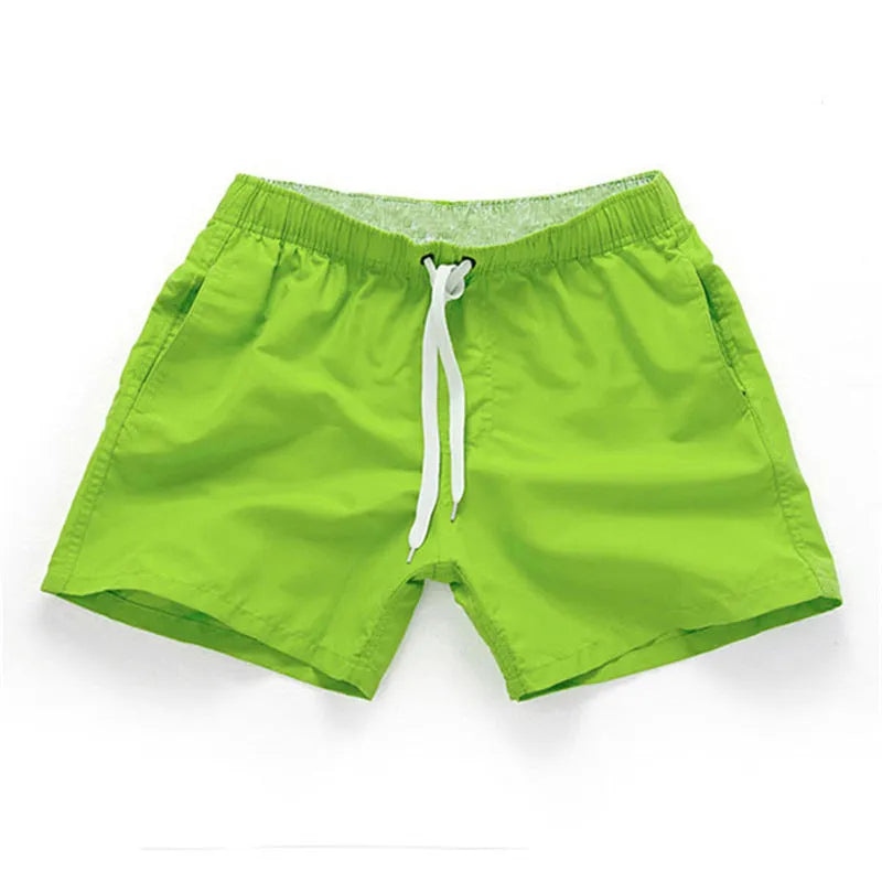 Men's polyester beach shorts in multiple colours with straight leg opening, suitable for surfing and swimming