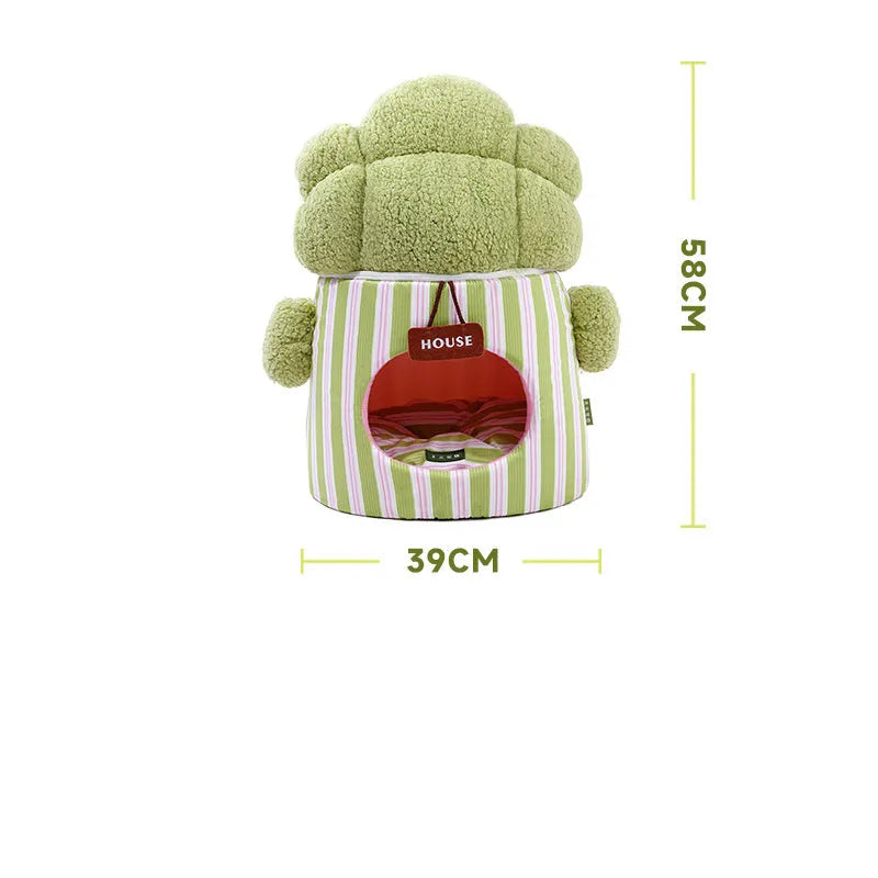 Green cauliflower-shaped enclosed cotton pet house for small dogs or cats on a wooden floor.