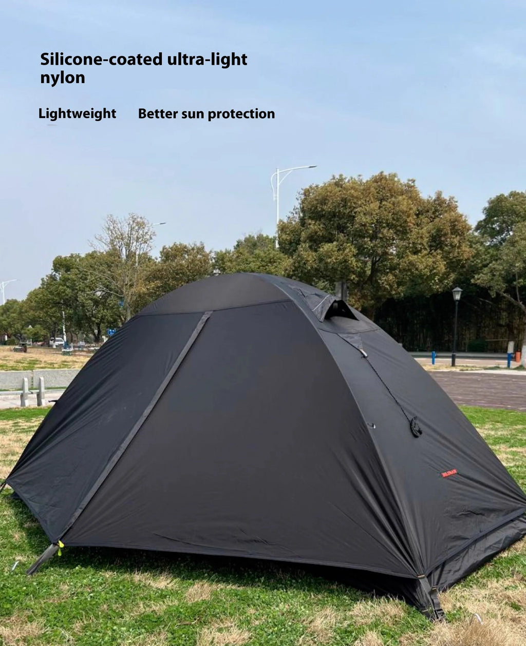 Single person camping tent with aluminium poles in red colour showing double layer construction