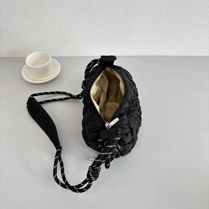 Women's lightweight nylon messenger bag in pillow shape with crossbody strap