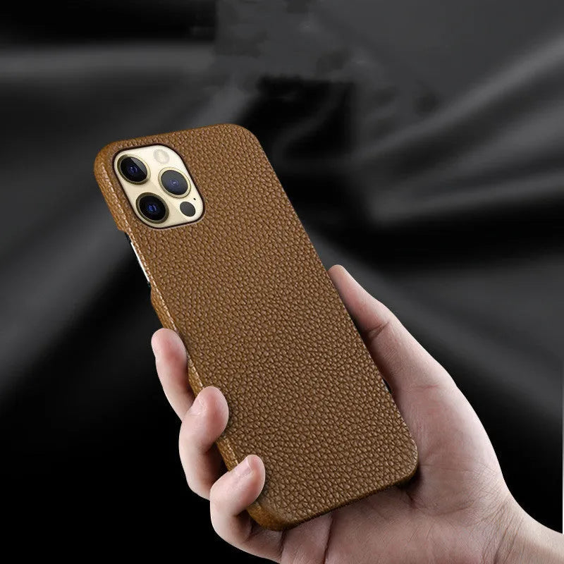Brown genuine leather iPhone case with half-split design on iPhone 14 Pro