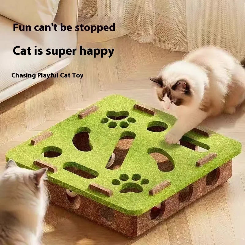 Green brown felt square cat toy with a hole in the centre on a wooden floor.