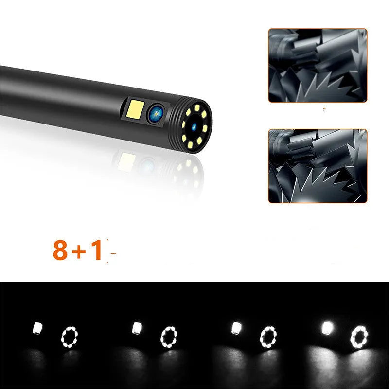 F300 wireless dual lens endoscope camera with 5.5mm and 8mm probes, hook, and magnet attachments on a table.