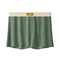 Three pairs of men's solid colour loose fit ice silk underwear in various colour combinations
