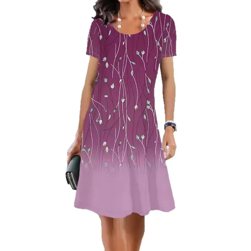 Light blue floral print summer dress with short sleeves and an A-line mid-length skirt on a hanger