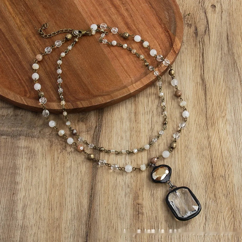 Tribal style adjustable necklace with stone and glass pendants in 2-layer design
