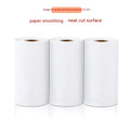 Three rolls of 57mm wide thermal paper on 30mm cores in an open box