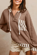 Straw yellow women's hoodie with waffle texture, striped patchwork, button neck, and drawstring waist.