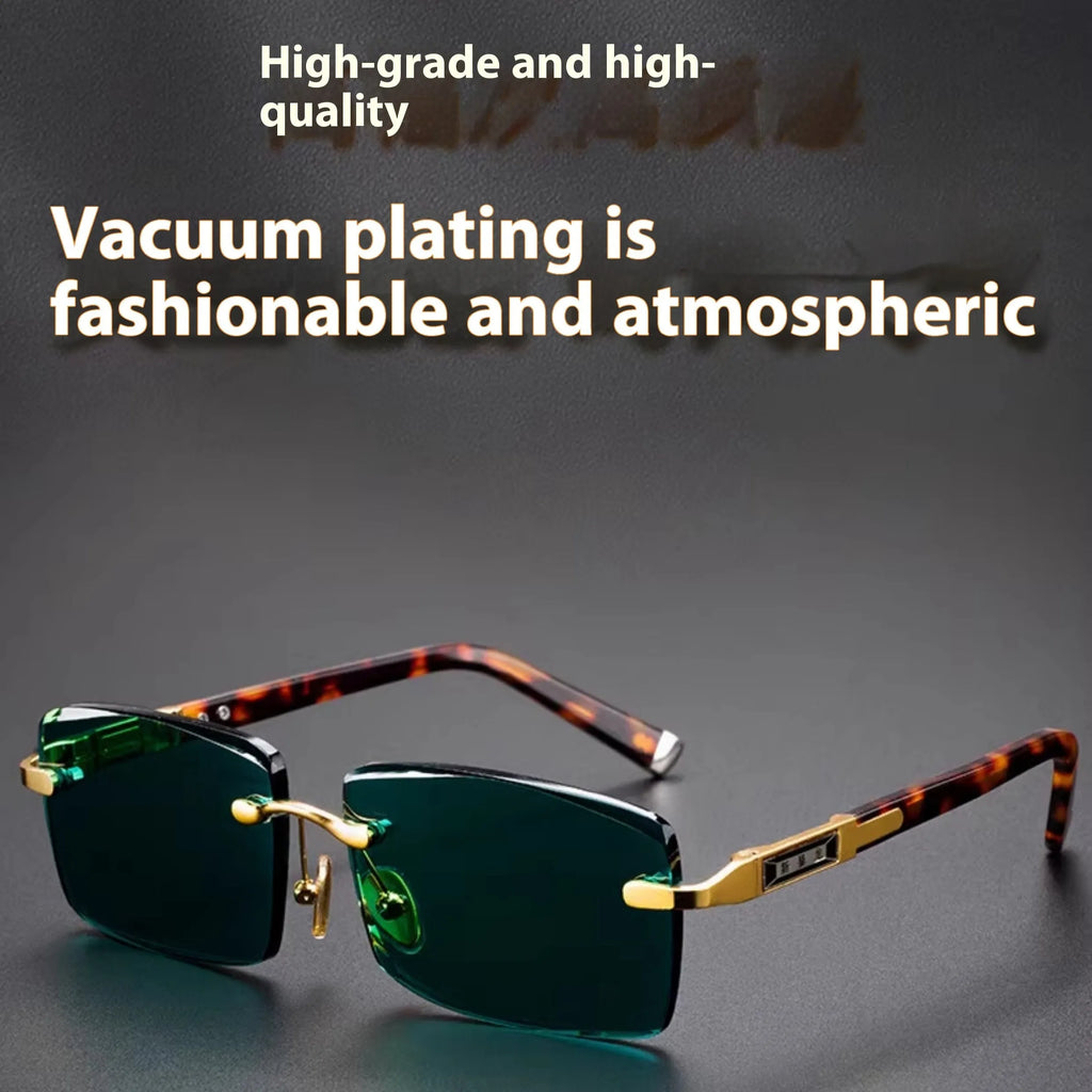 Dark green frameless crystal sunglasses inside a hard case with a cleaning cloth.
