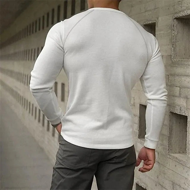 Men's white Henry collar long-sleeved cotton blend T-shirt laid flat showing stitching details