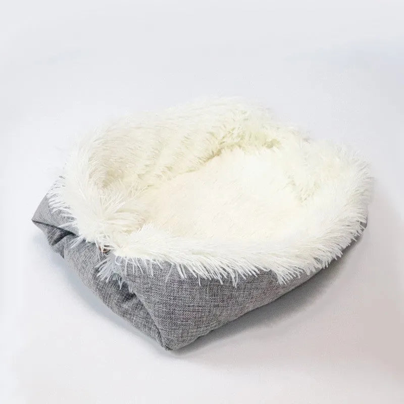 Grey pet plush sleeping pad measuring 61cm by 51cm with a black non-slip bottom.