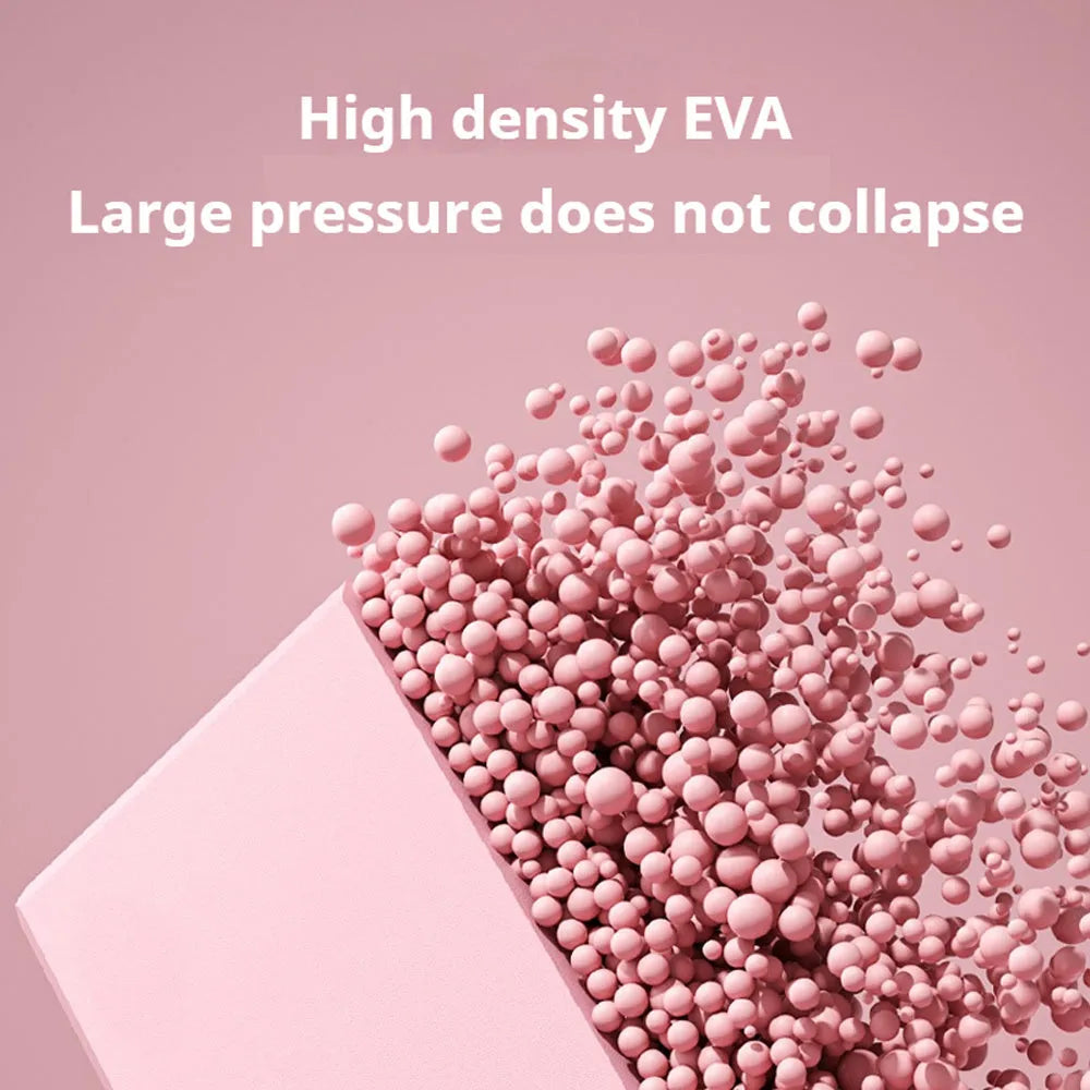 Solid colour EVA foam yoga brick block with hexagonal facets for grip, measuring 23x15x7.6cm.