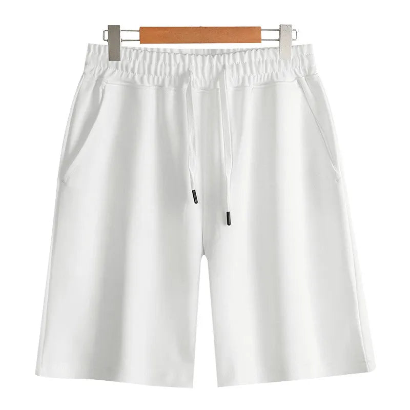 Men's straight leg cotton sports shorts in light grey on a hanger.