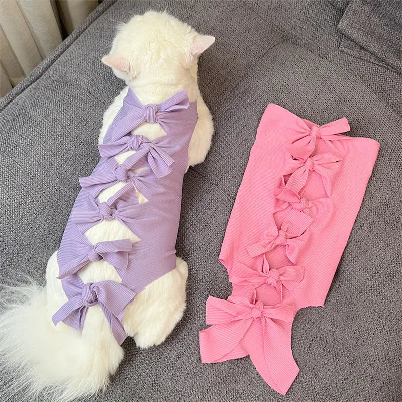 Lace-up cat sterilisation recovery garment in blue, showing adjustable ties and full torso coverage.