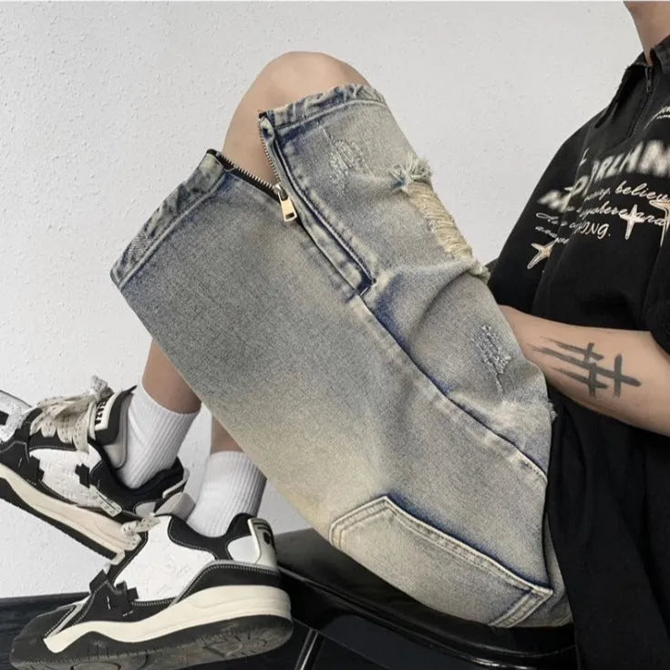 Blue retro denim shorts with tattered detailing and a wide leg loose fit