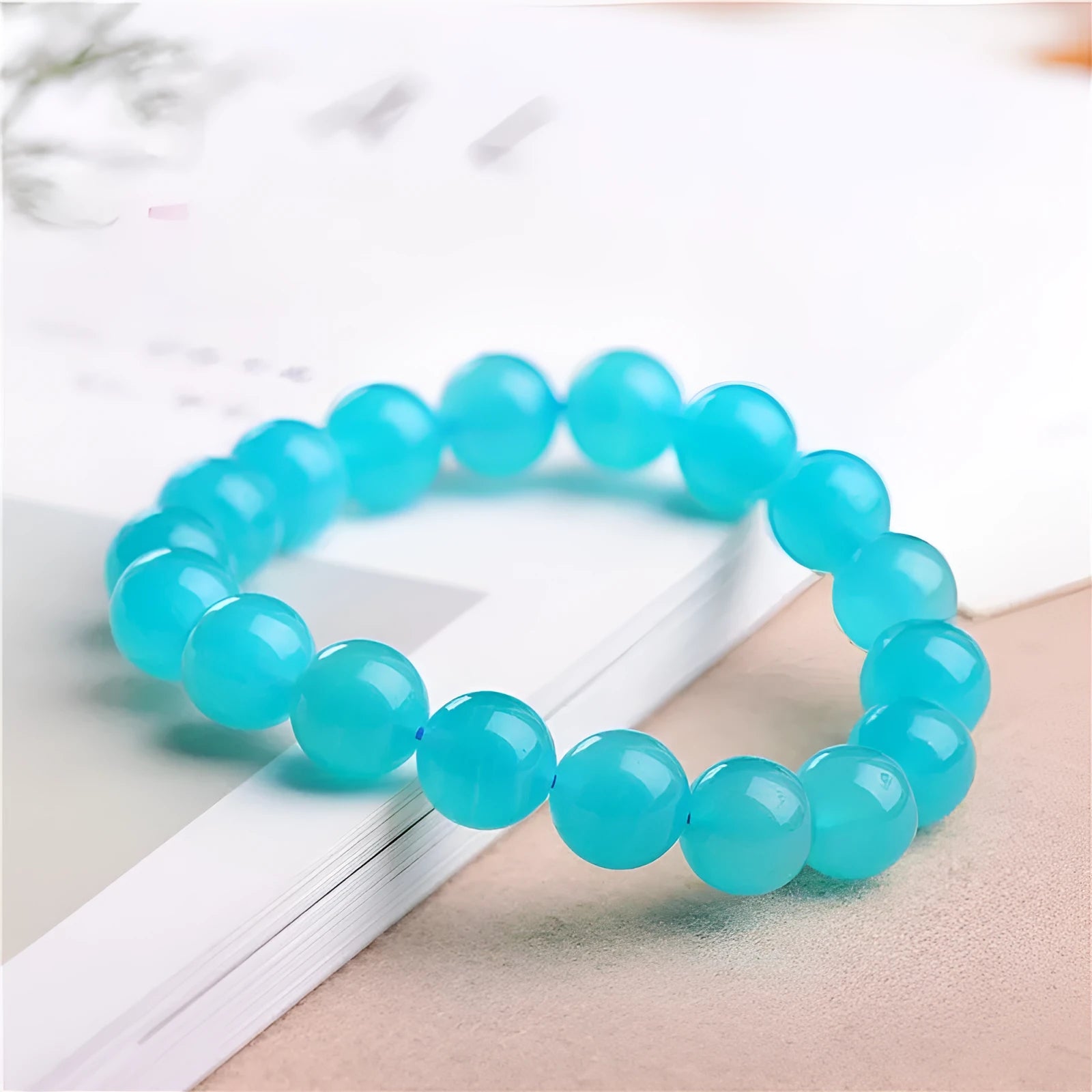 Grade 7A Amazonite natural gemstone scattered beads showing blue-green ice colouration and polished surface