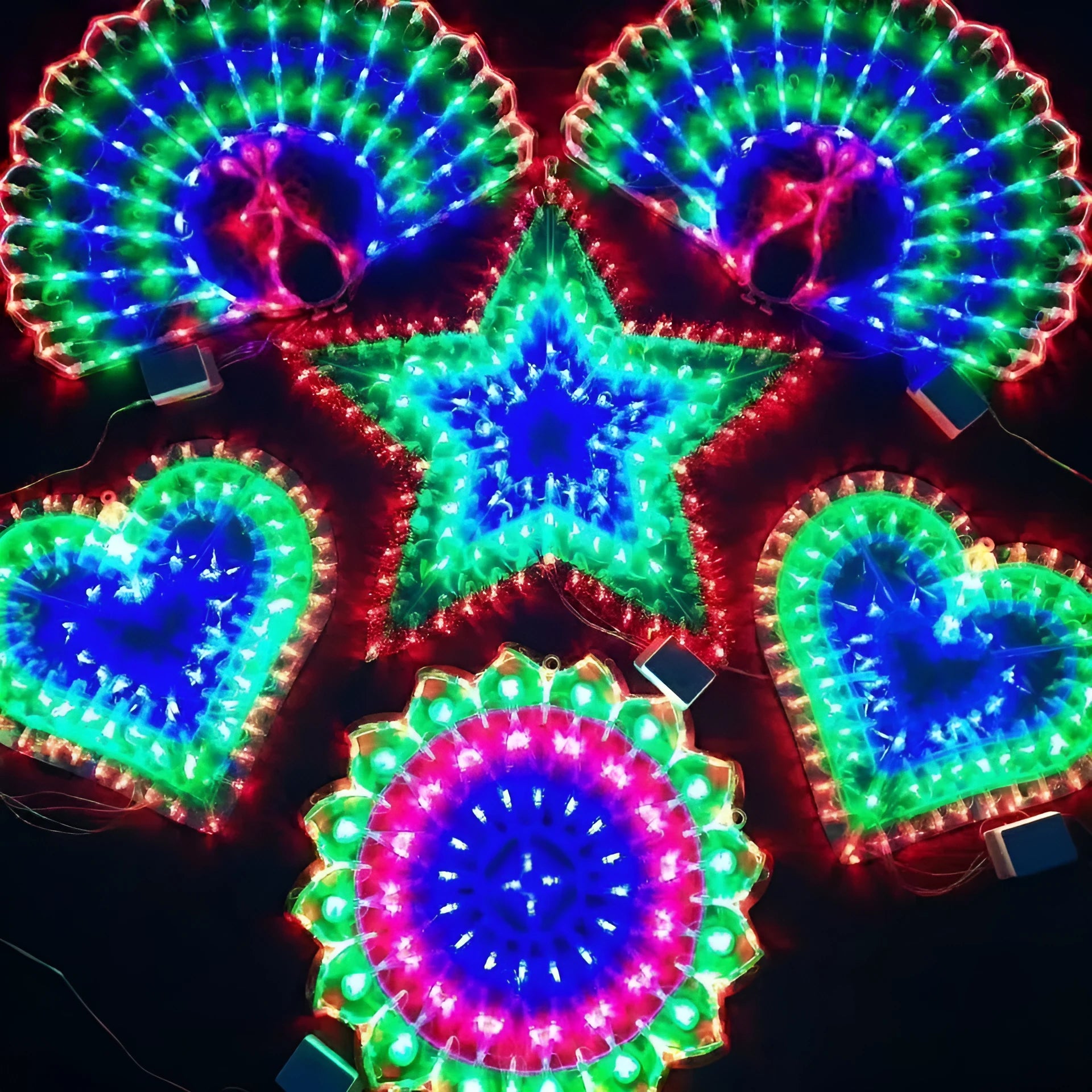 Outdoor Christmas string lights with decorative peacock, heart, sunflower and star bulb designs