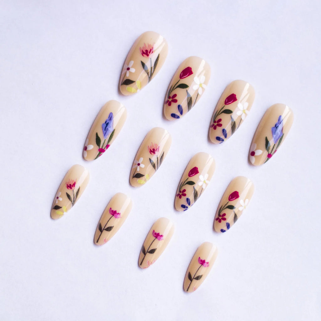 Almond-shaped removable nail art with floral patterns including roses and tulips
