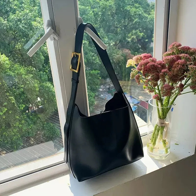 Women's soft PU shoulder bag set showing black ribbon and brown packet versions with swing threads detail