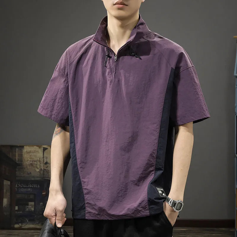 Man wearing a brown half-zip stand collar short sleeve shirt made of Ice Silk fabric.