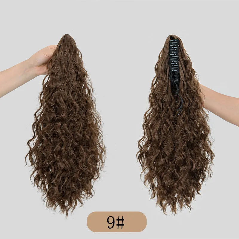 Synthetic corn curler wig with a textured water ripple grip ponytail, shown in a dark brown colour.