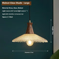 Retro style wooden and brass chandelier with glass shade ceiling lamp for restaurants.