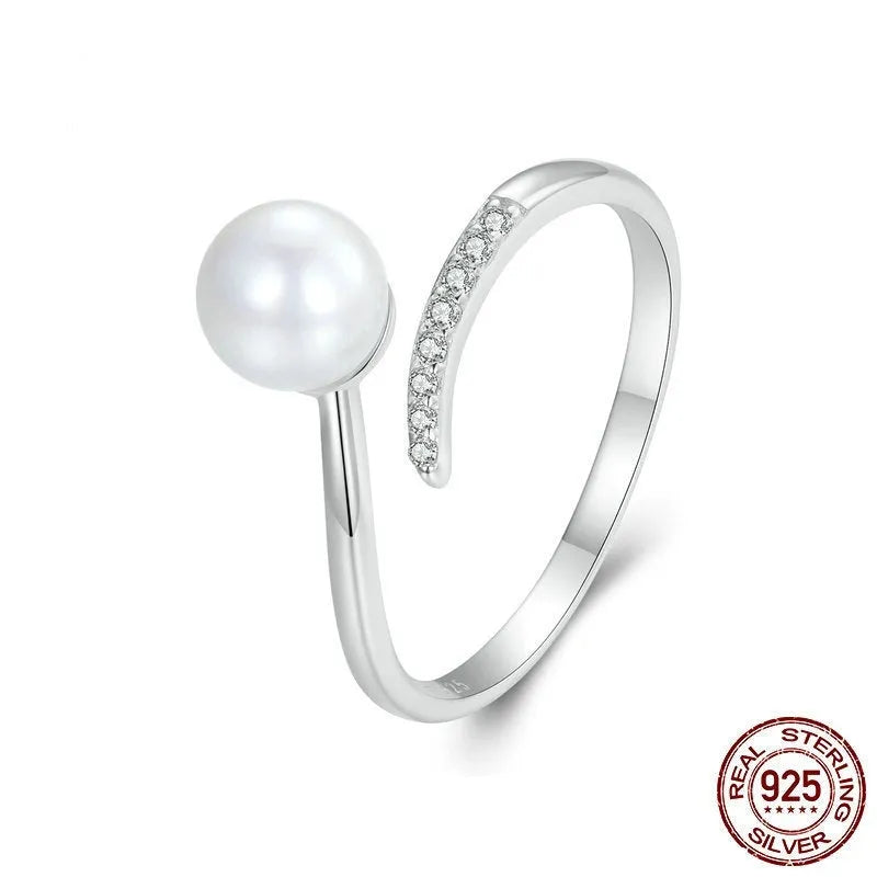 Adjustable open loop sterling silver ring with natural shell pearl in 8 US sizing