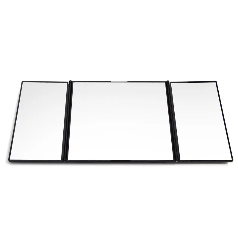 Silver car folding makeup mirror shown both closed at 15.5cm and open at 30.5cm wide.