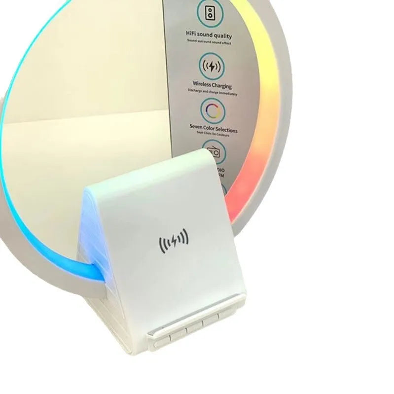 White smart Bluetooth speaker with wireless charging pad and ambient light on top.