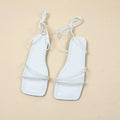 Women's flat sandals with ankle ring bandage cloth design in black, square toe, front lace-up closure