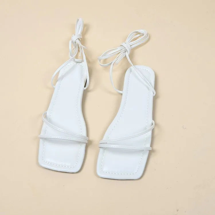 Women's flat sandals with ankle ring bandage cloth design in black, square toe, front lace-up closure
