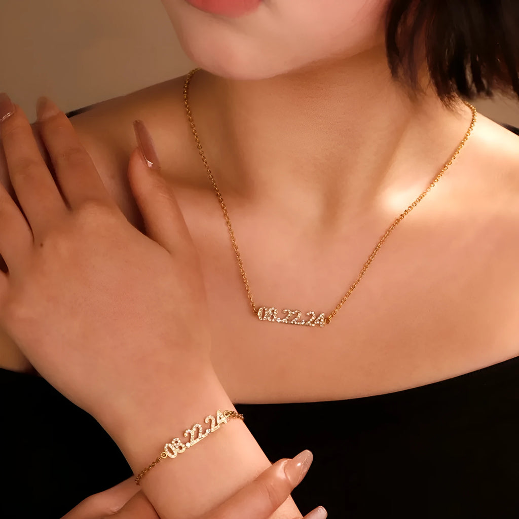 Stainless steel digital bracelet with diamond-studded face on a wrist.