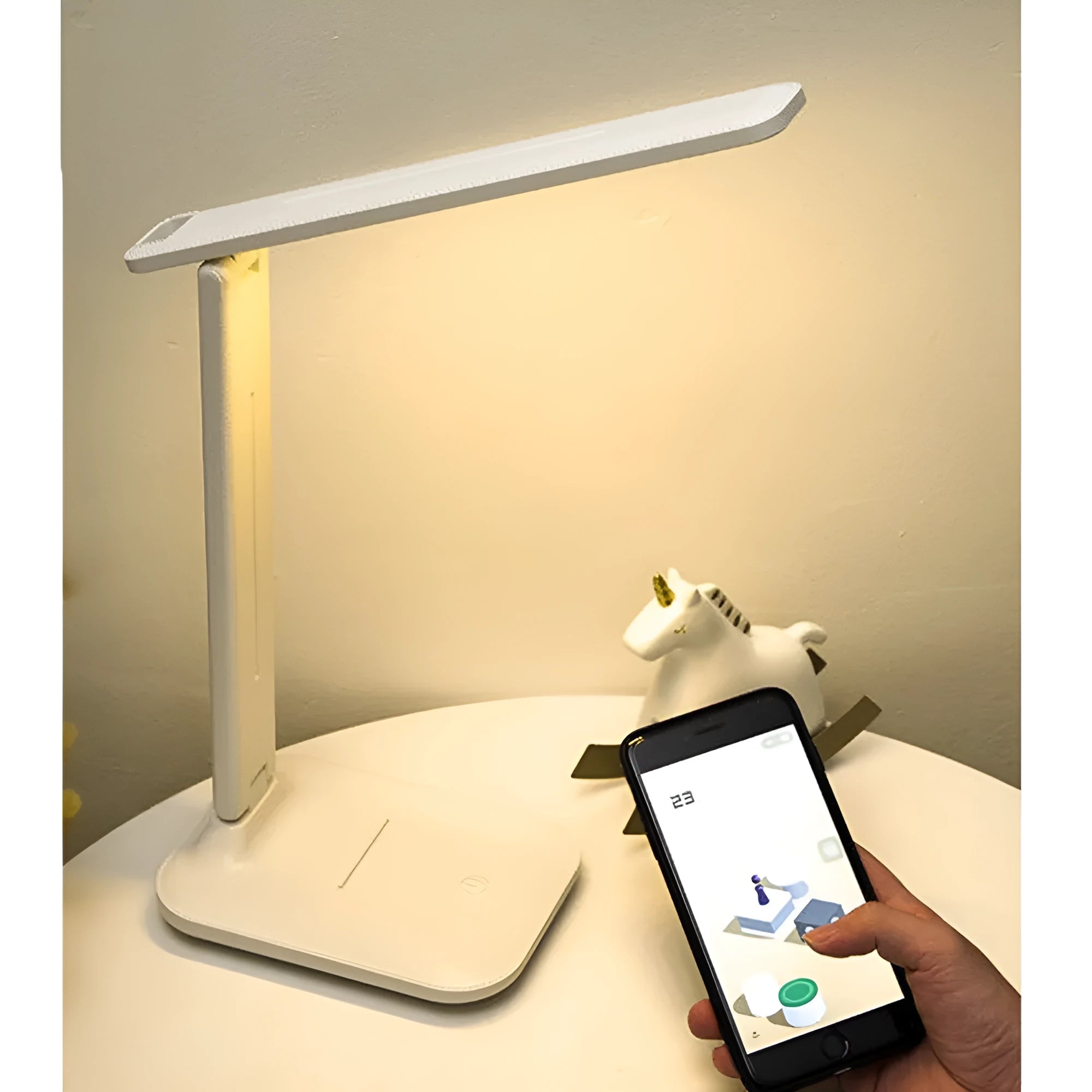 White plastic LED table lamp with touch dimming control and USB charging for children's bedroom use