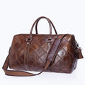 Vintage brown cowhide leather men's duffel bag with a single shoulder strap, shown open to reveal internal organiser pockets.