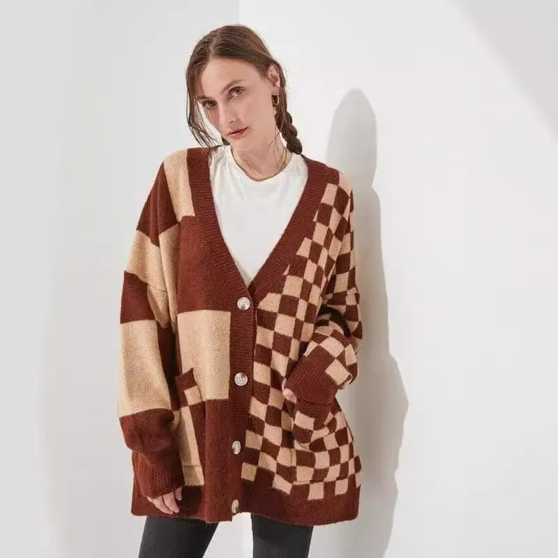 Woman wearing a loose slim fit cardigan with a printed checks pattern in a colour selection.