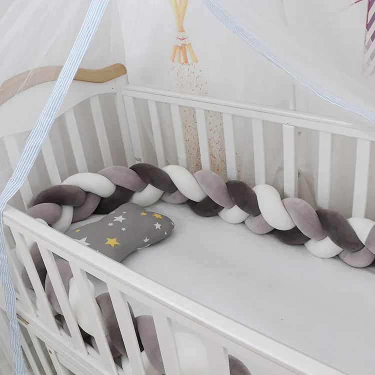 Baby crib bumper in crystal velvet with braid knot design showing flexible length options for cot protection