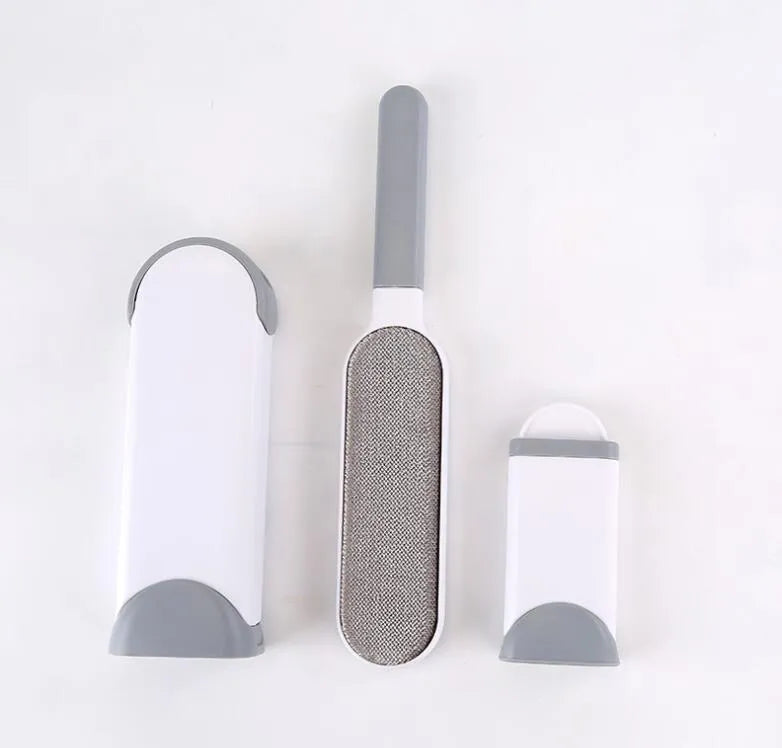 Blue reusable pet hair removal comb with a large double-sided sticky brush and a self-cleaning base unit.