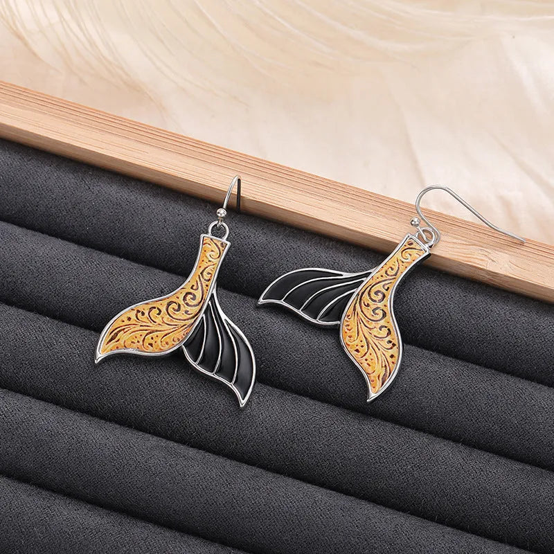 White gold colour fishtail earrings with retro whale design for women