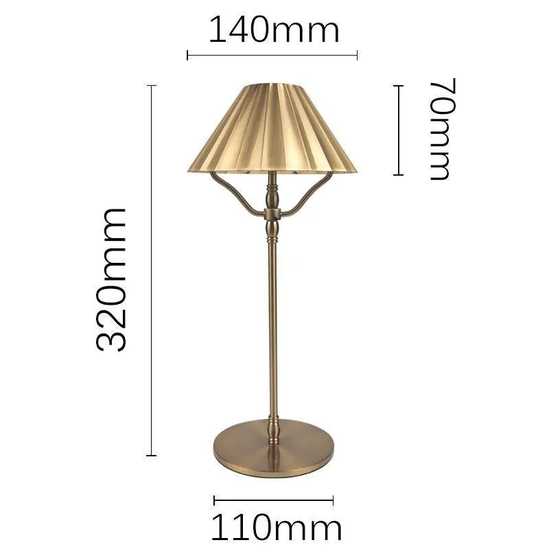 Gold alloy desk lamp with touch controls and Type-C charging port on a wooden desk