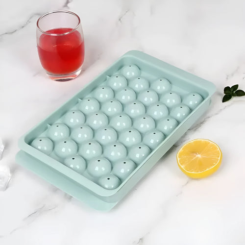 33 grid round silicone ice cube tray with lid in blue or pink measuring 24x14x3cm