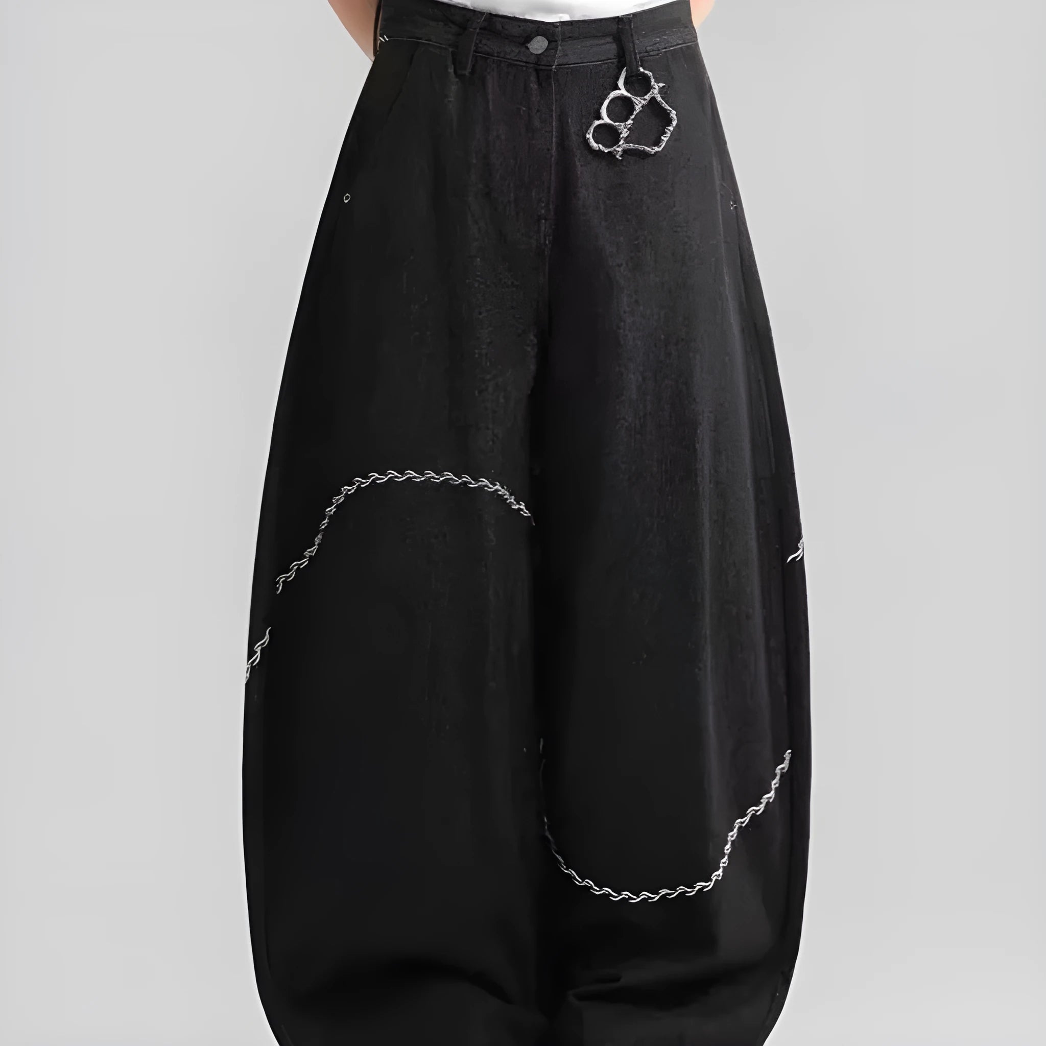 Black straight-leg jeans with micro-elastic polyester denim fabric showing zip fly and mid-rise waist