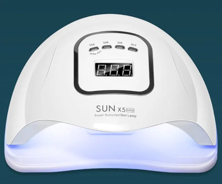 White nail polish baking lamp with UV LED lights and timer controls for gel manicure drying
