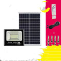 Black solar-powered LED flood light for outdoor garden use with remote control.