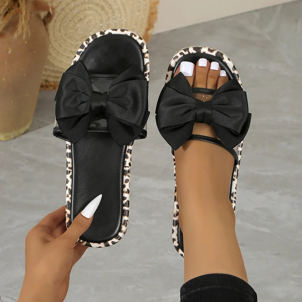 Leopard print women's beach slippers with thick sole and round toe in black or white